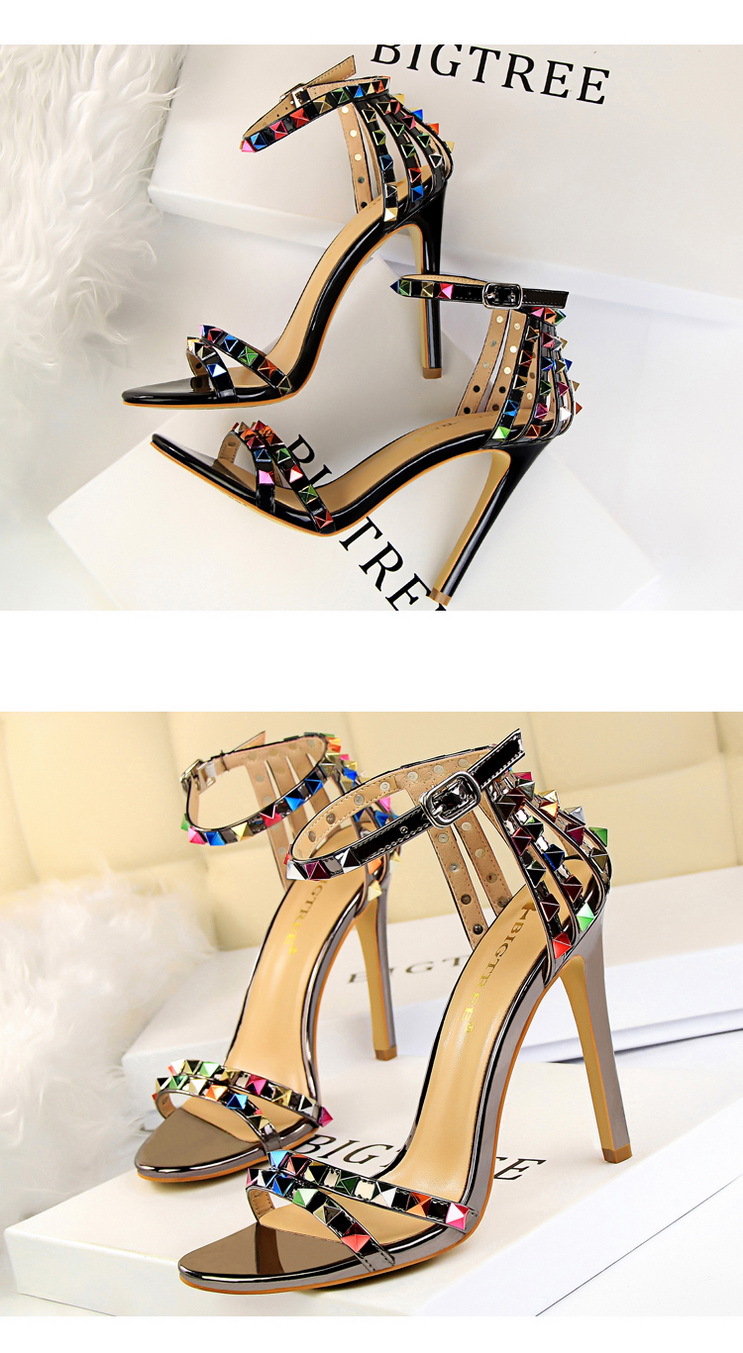 Title 14, Open-toe sandals with cutout colorful studs. St...