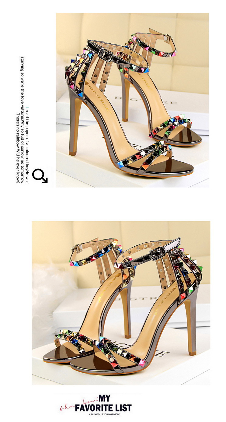 Title 15, Open-toe sandals with cutout colorful studs. St...