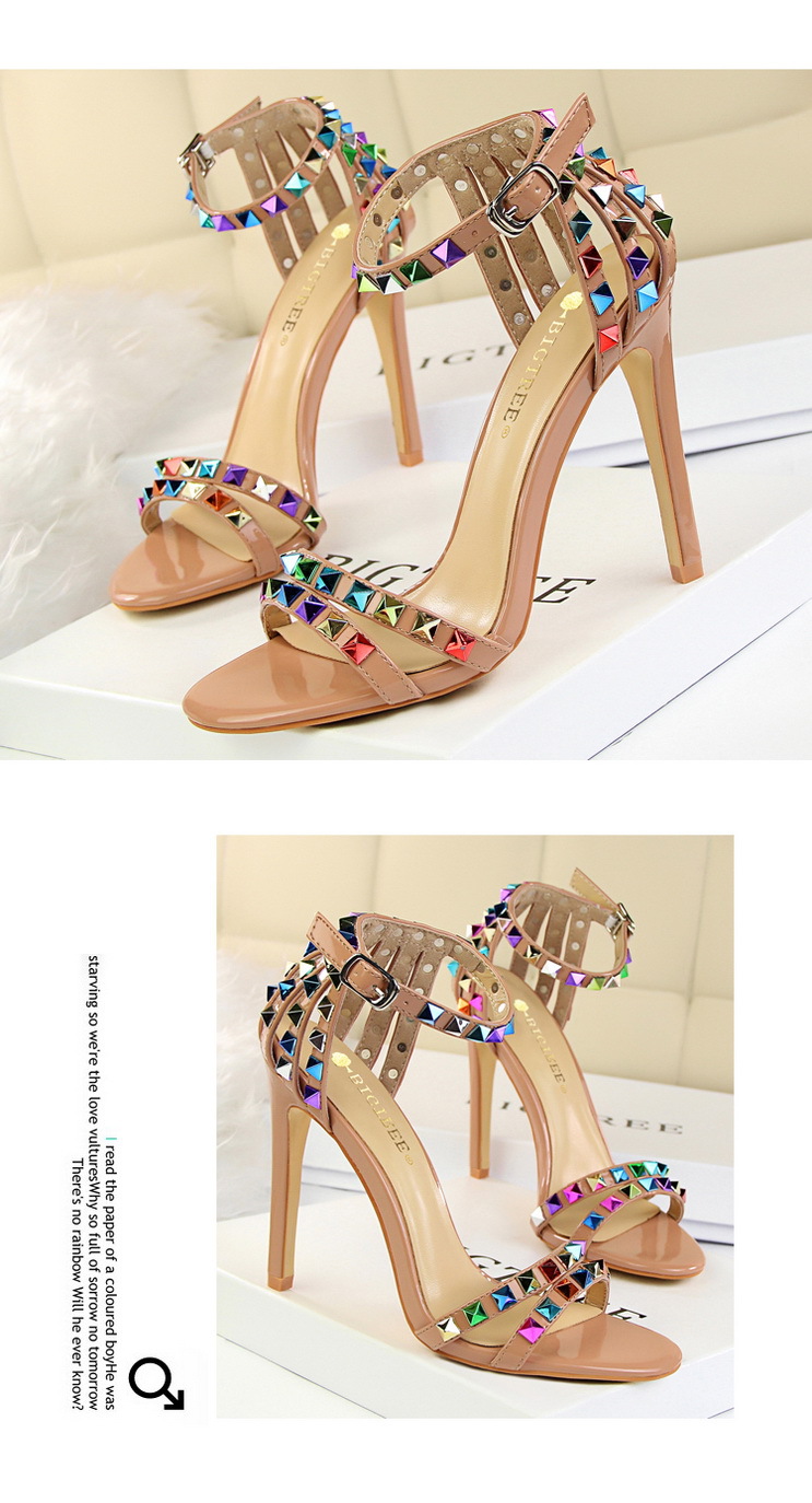 Title 17, Open-toe sandals with cutout colorful studs. St...