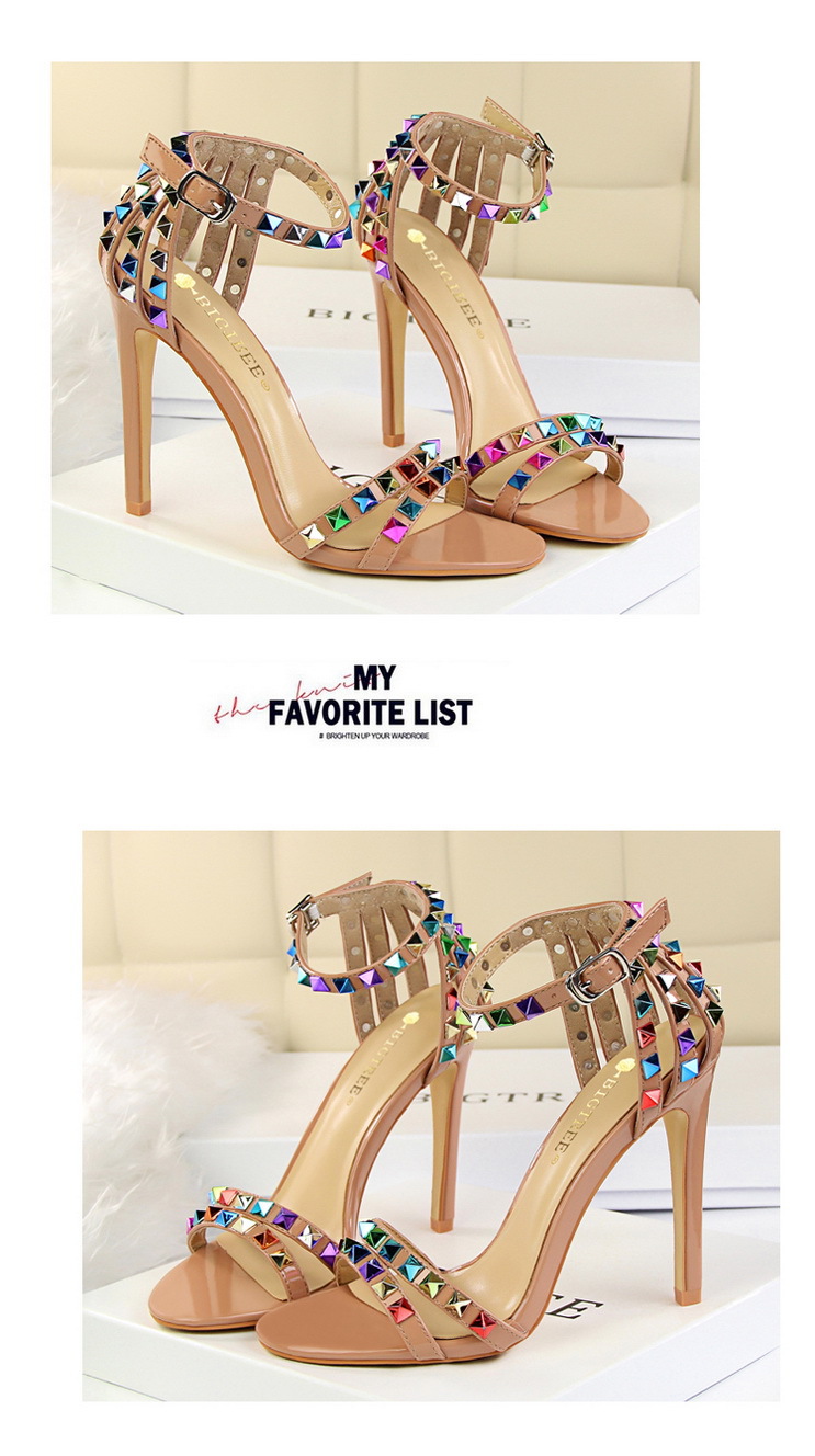 Title 18, Open-toe sandals with cutout colorful studs. St...