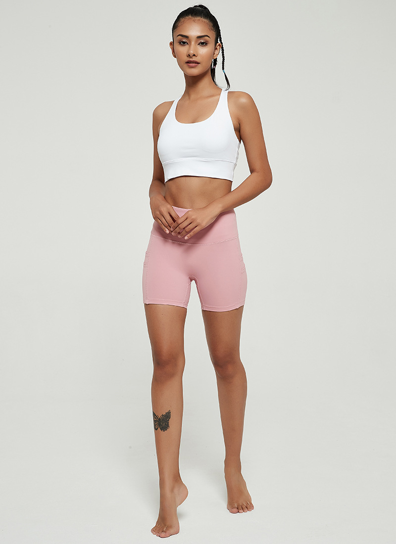 Title 9, Zomer ademende yoga shorts met zakken, perzik b...