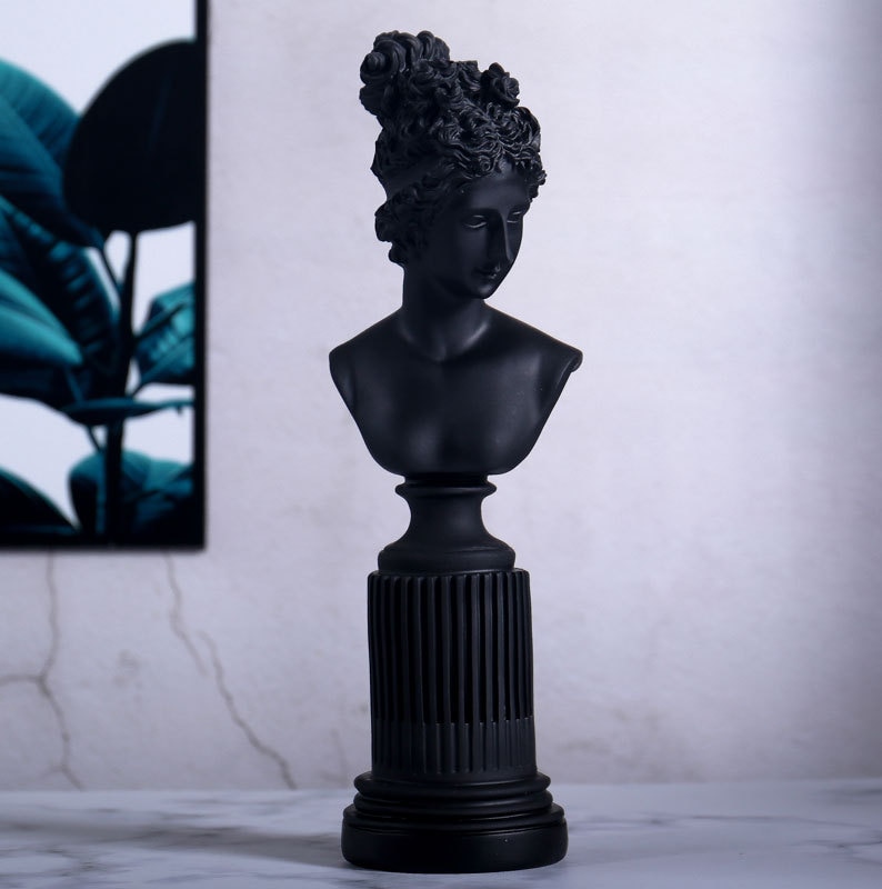 The Furya Goddess sculpture placed in a stylish home office setting, inspiring creativity and a sense of empowerment.