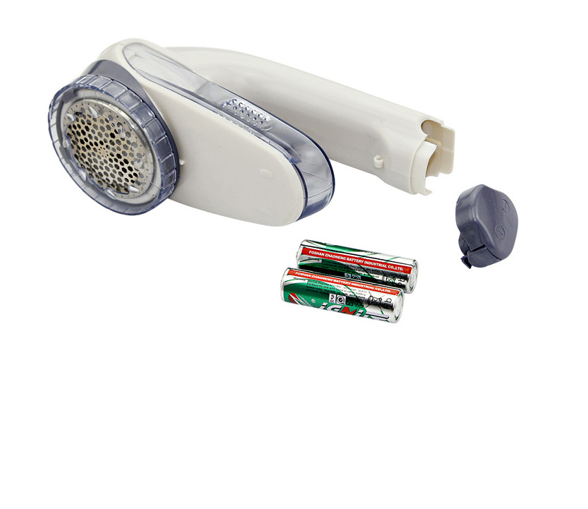 Title 2, Battery-powered clothes shaver. Removes lint, f...