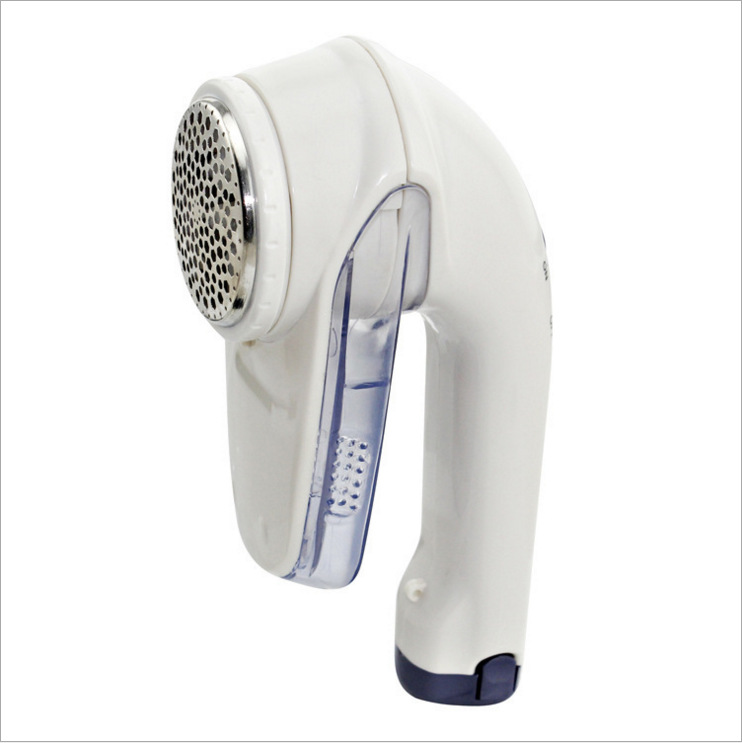 Title 6, Battery-powered clothes shaver. Removes lint, f...