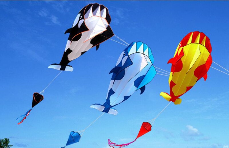 Black, Yellow and Blue Kites in the Sky