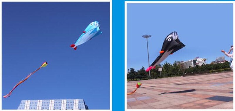 Black and Blue Dolphin Kites in the Sky