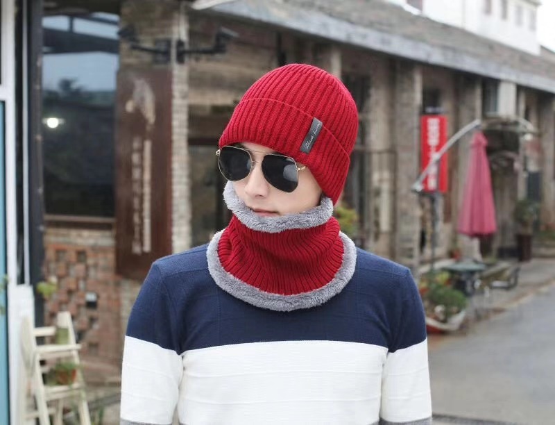 Title 9, Knitted wool cap for warmth and comfort. A styl...