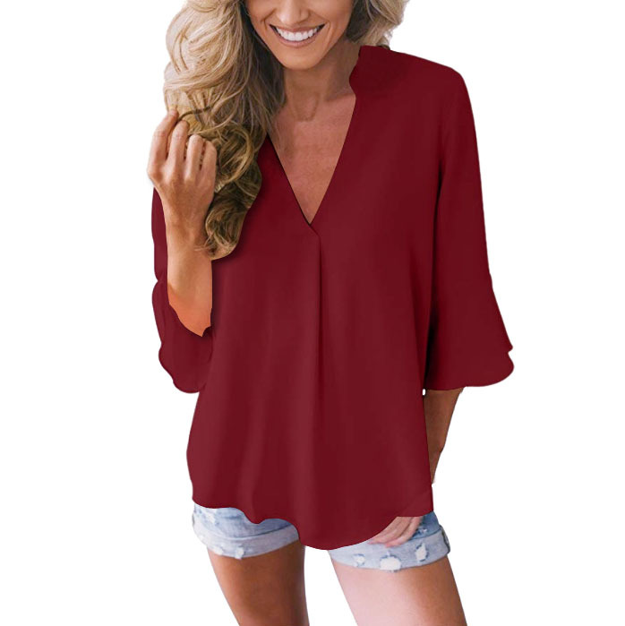 Title 7, V-neck ruffle sleeve loose chiffon shirt. Offer...