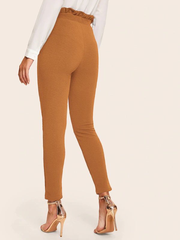 Title 9, Orange paper bag belt tights for a stylish look...