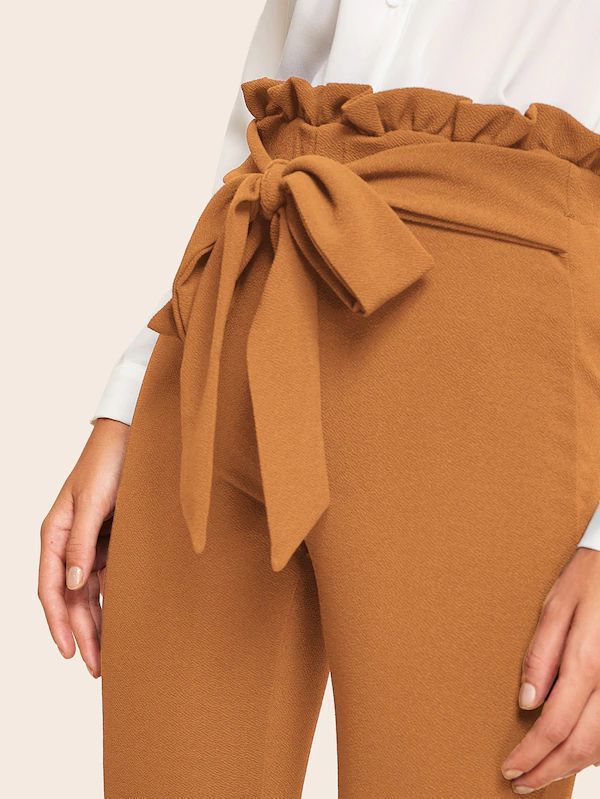 Title 10, Orange paper bag belt tights for a stylish look...