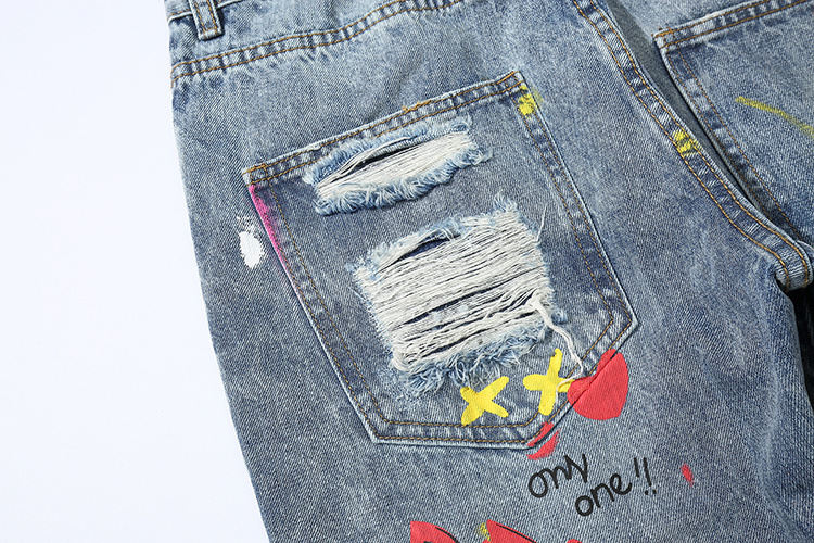 Title 12, Graffiti ripped jeans for a bold street style. ...