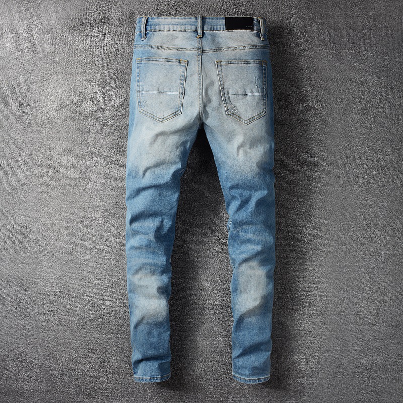 Title 2, Jeans slim fit con patch a motivo plissé e gamb...