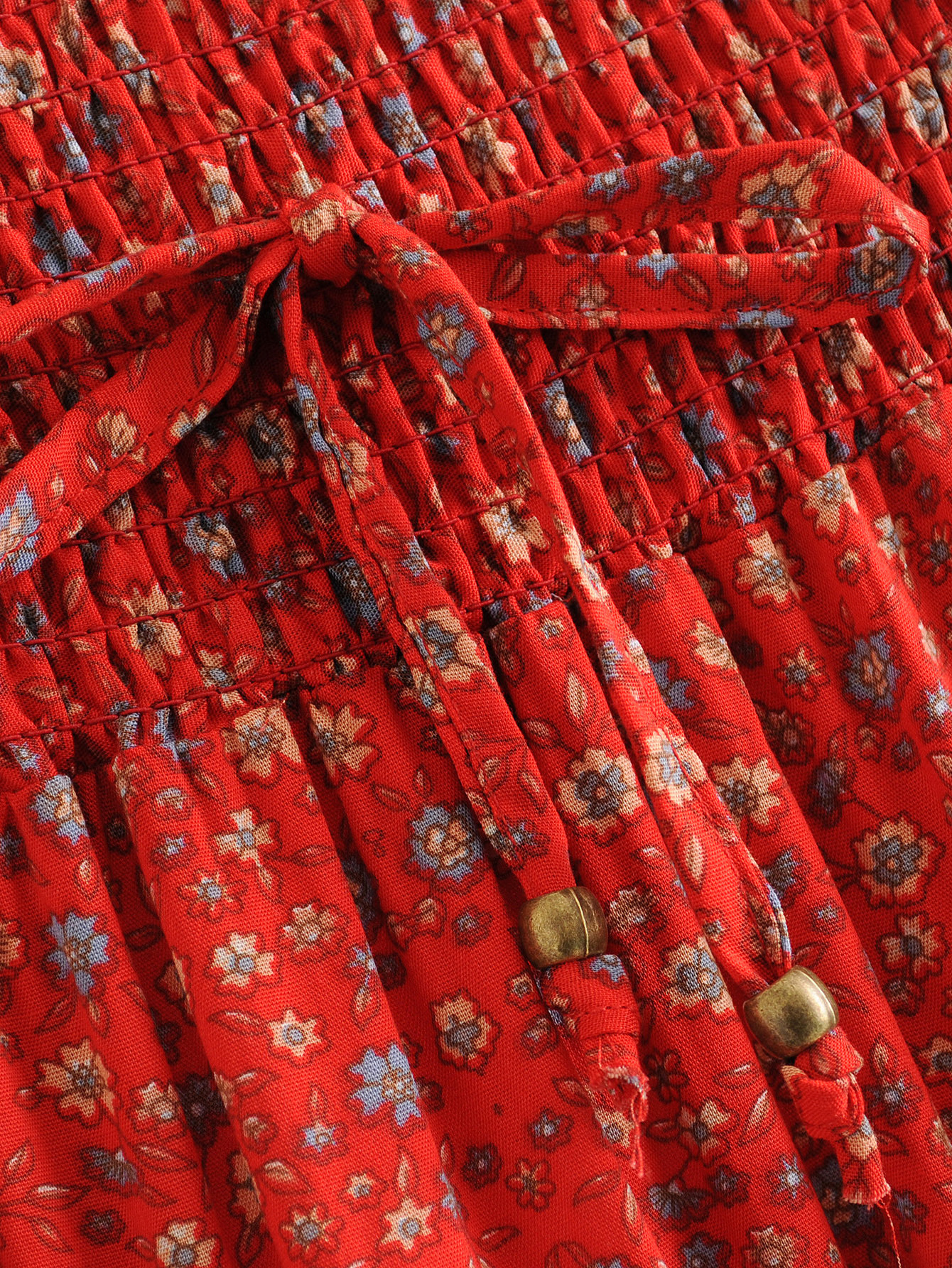 Title 6, Printed red sunflower cutout skirt, a vibrant a...