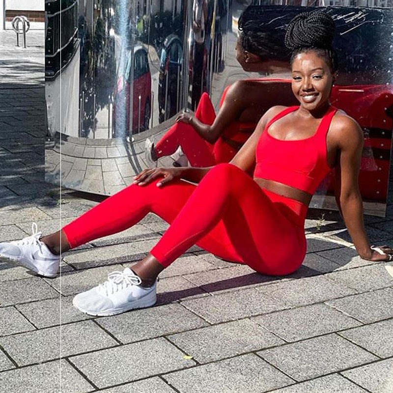 Matching Leggings and Sports Bra Set red model sitting