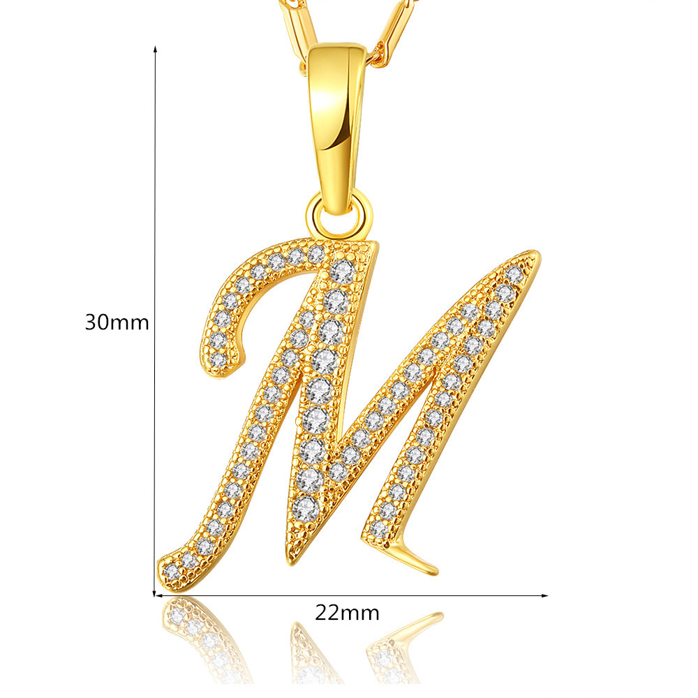 Title 1, 18K gold zircon pendant