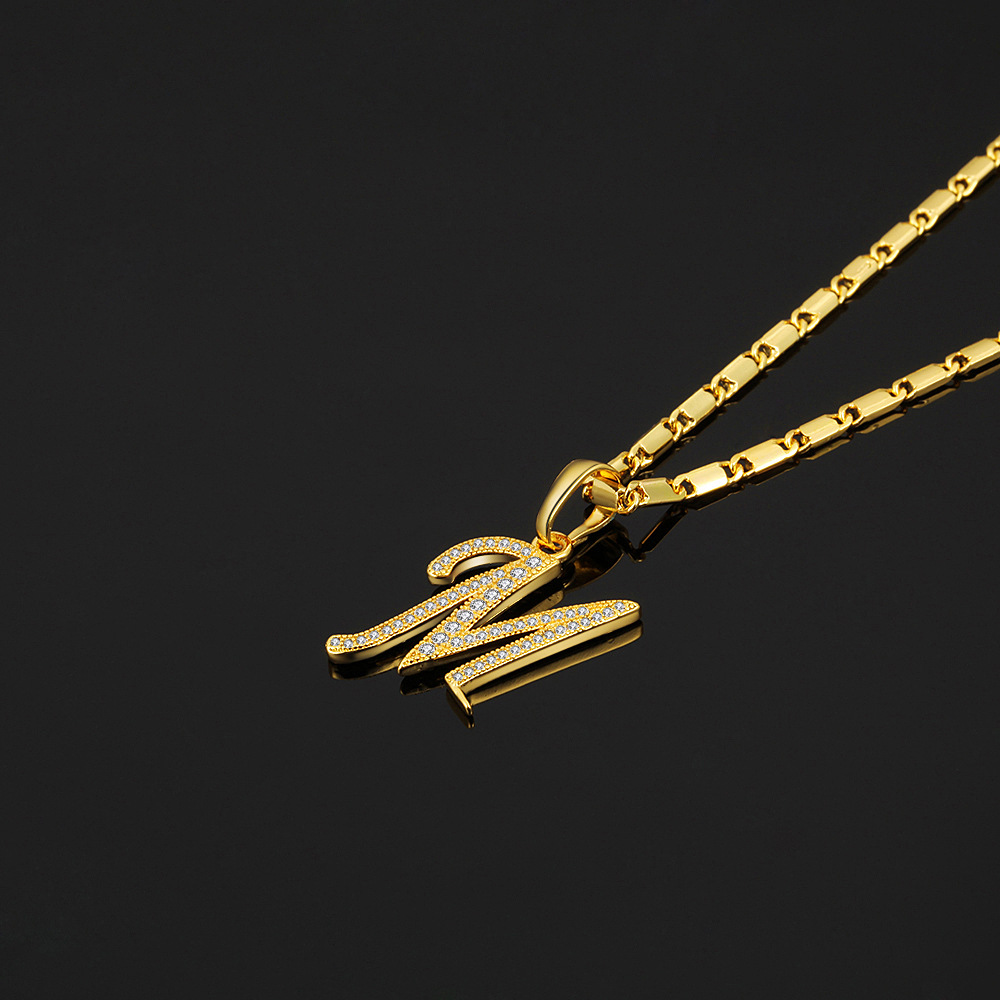 Title 2, 18K gold zircon pendant