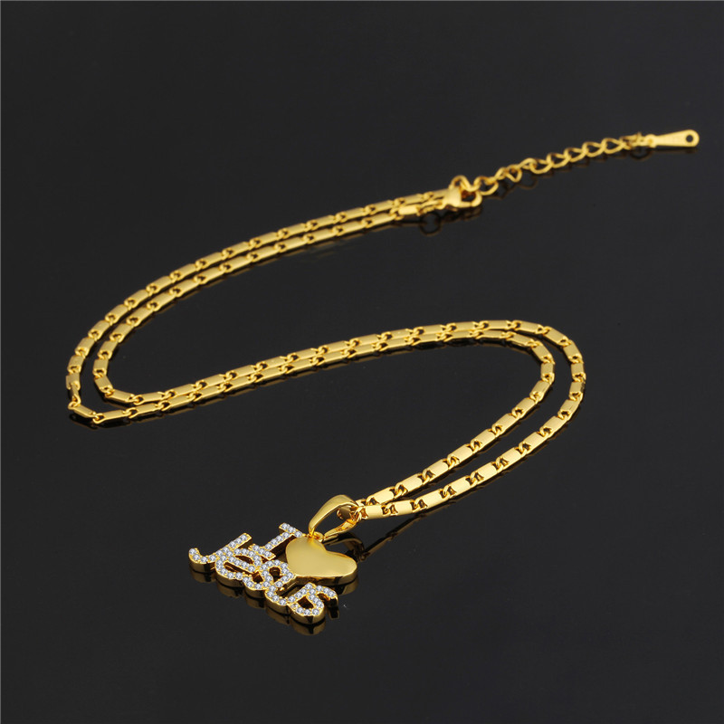 Title 32, 18K gold zircon pendant