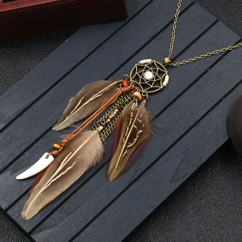 Title 2, Feather necklace round hollow dream catcher