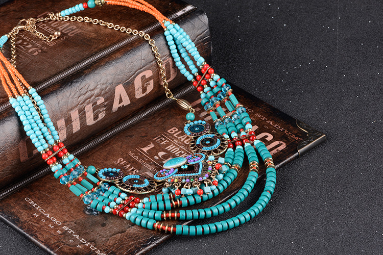 Title 6, Exaggerated ethnic necklace