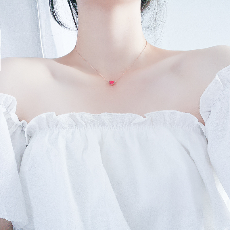 Title 1, Discolored small red heart necklace