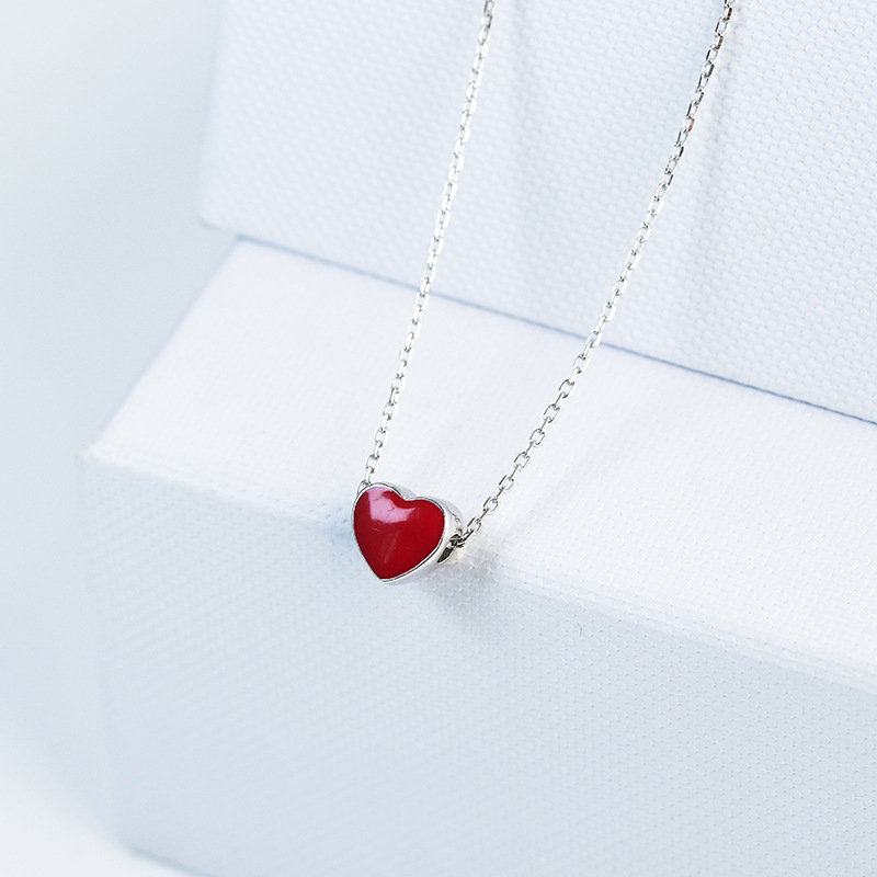 Title 4, Discolored small red heart necklace