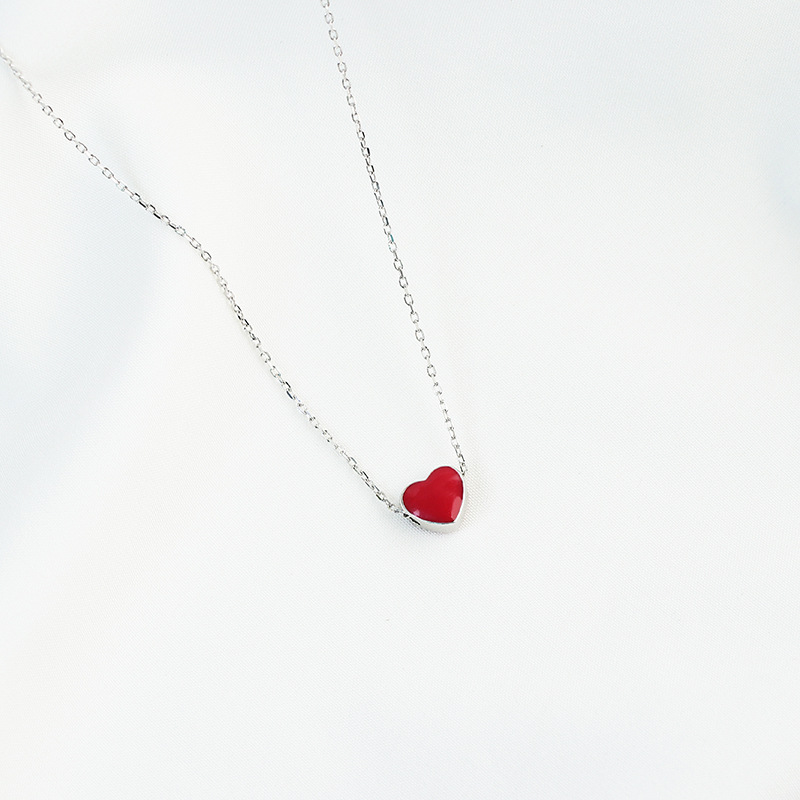 Title 8, Discolored small red heart necklace