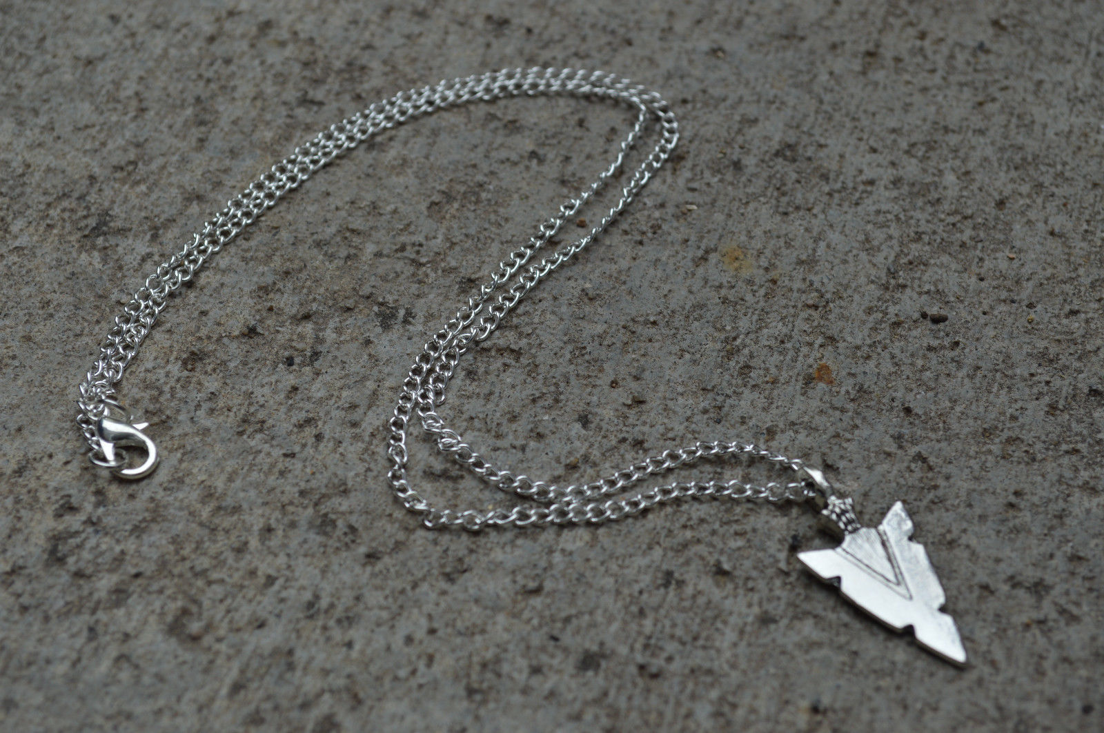 Title 1, Arrow pendant