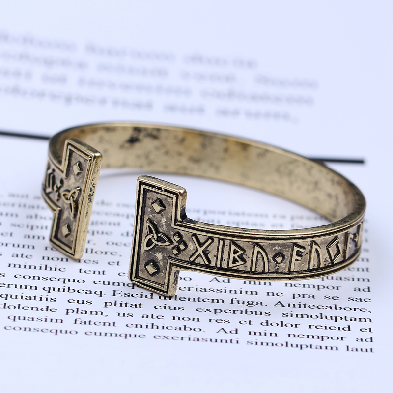 Title 5, Ancient gold text bracelet