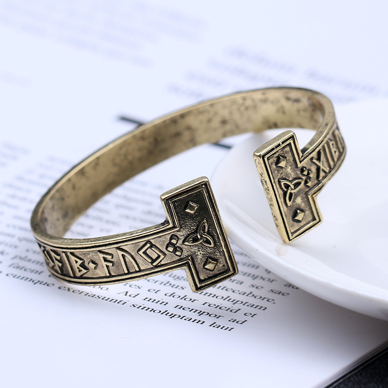 Title 8, Ancient gold text bracelet