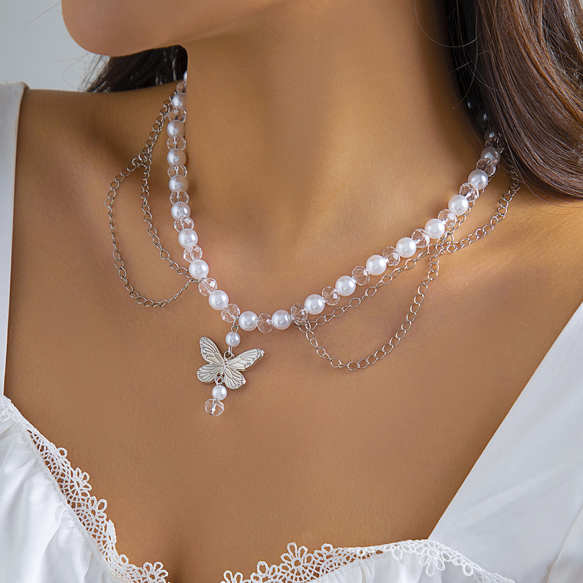 Title 2, Collana da donna con croce di perle d