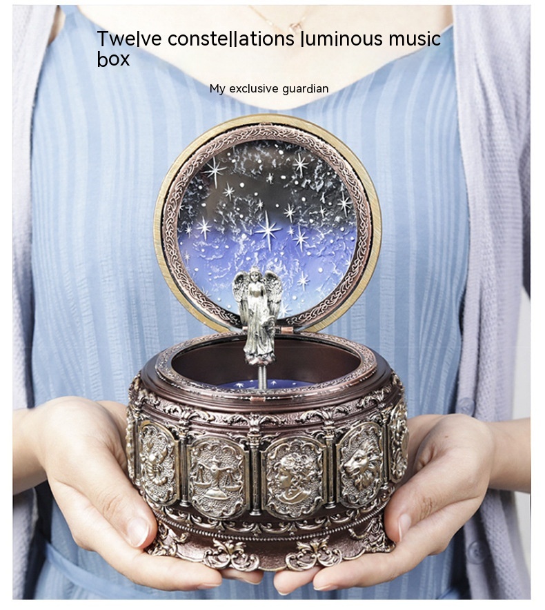 Title 3, Retro Rotating Luminous Constellation Music Box...