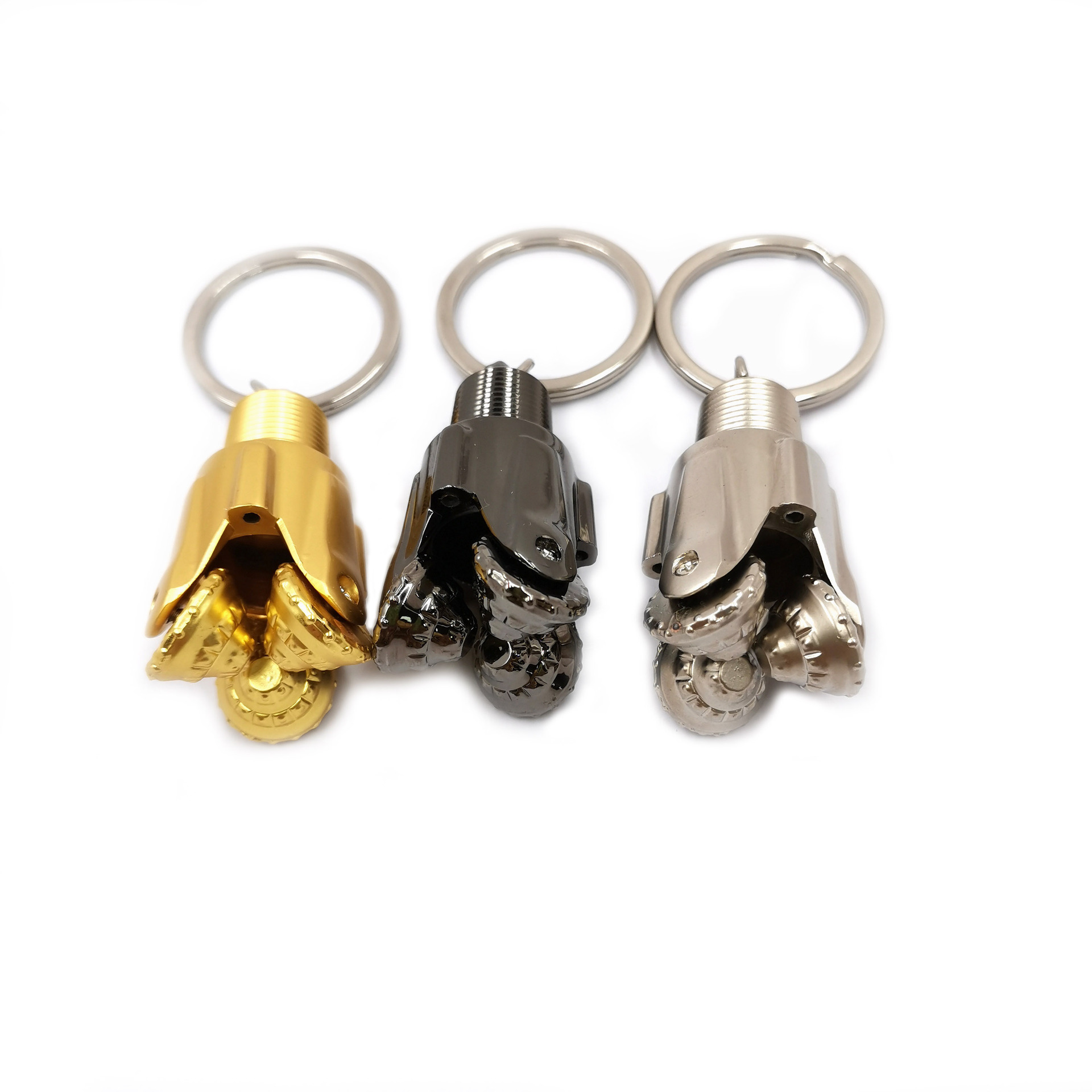 ميدالية مفتاح ثلاثية الأبعاد بموديل عجلة سانيا ثلاث الألوان