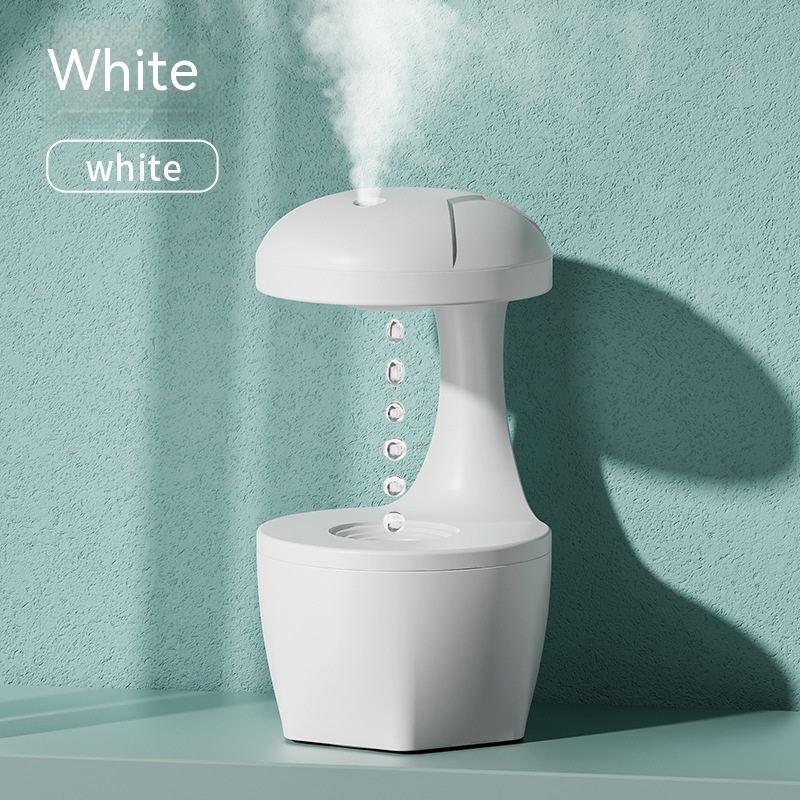 Anti-gravity white humidifier with silent operation, ideal for small rooms.