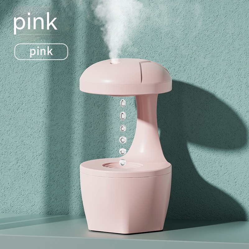 Anti-gravity white humidifier with silent operation, ideal for small rooms.