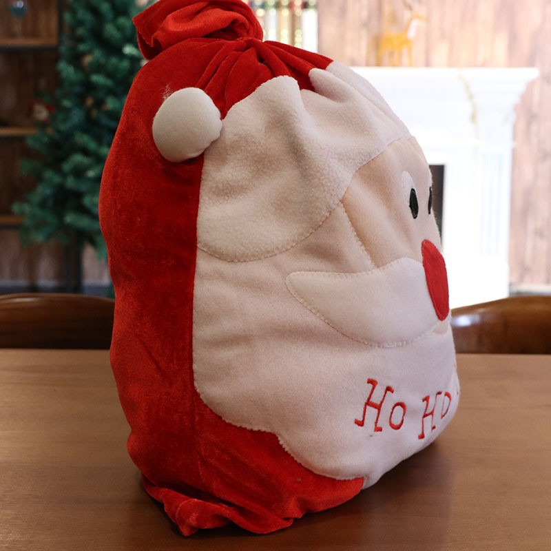 حقيبة ظهر مخملية ذهبية بتصميم سانتا كلوز مع حلوى