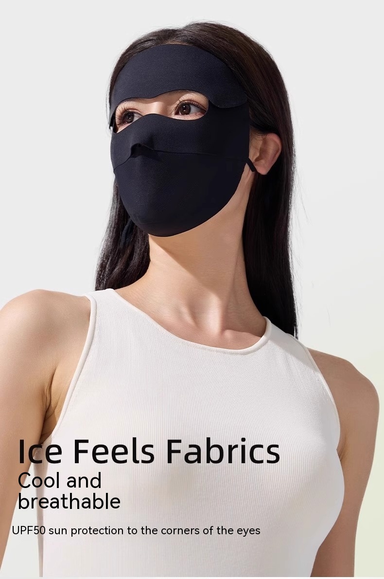 A person is wearing the Facekini Full Face Sunscreen Mask in black, which covers the forehead, eyes, and nose. Paired with a white sleeveless top, this mask features "Ice Silk Fabrics that are cool and breathable" and provides Nylon UPF50 sun protection to the corners of the eyes.