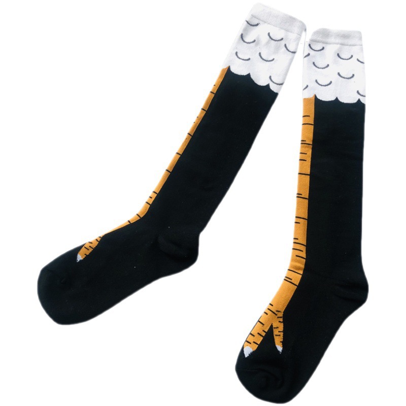 Pair of novelty knee-high socks featuring a fun bird leg design with yellow claw details on the toes, black base, and white top with feather-like patterns.