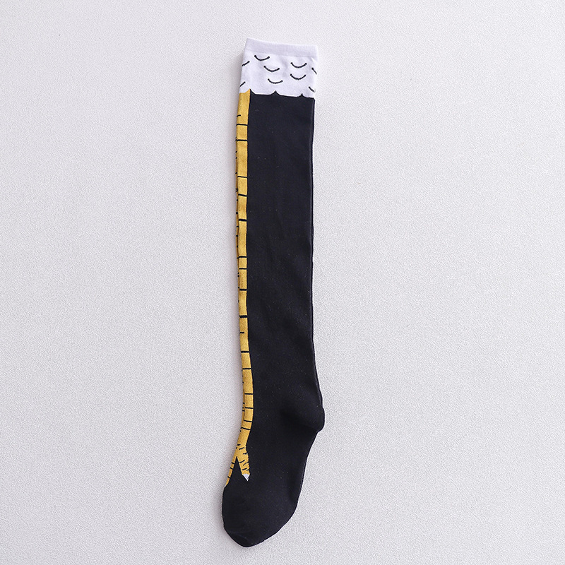 Single novelty knee-high sock with a bird leg design, featuring a yellow talon graphic on the foot, black body, and white top with scalloped feather-like detailing.