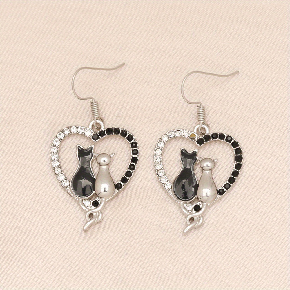 Title 5, Black Dripping Kitten Love Heart Earrings