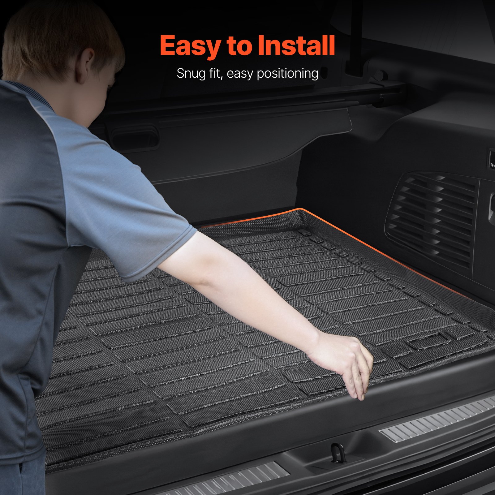 Precise-fit cargo mat for 2015-2020 GMC Yukon XL showing raised edges