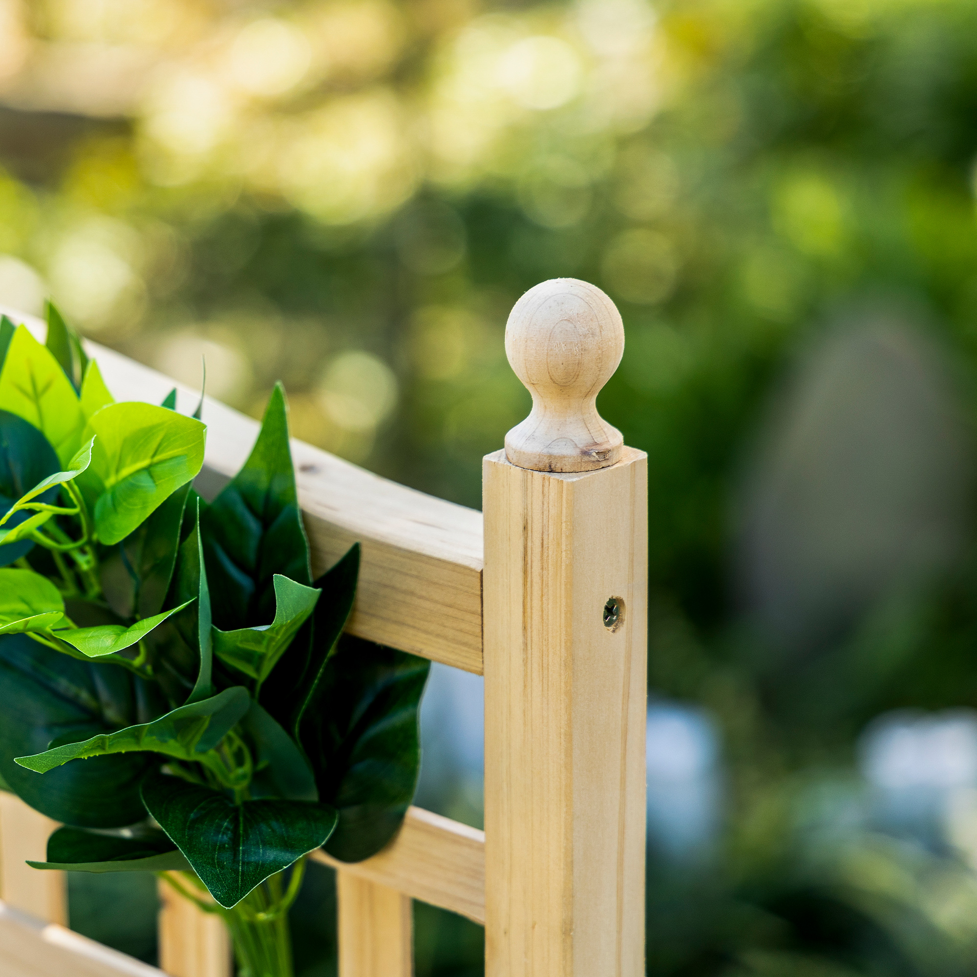 Outdoor climbing plant planter box with trellis on patio