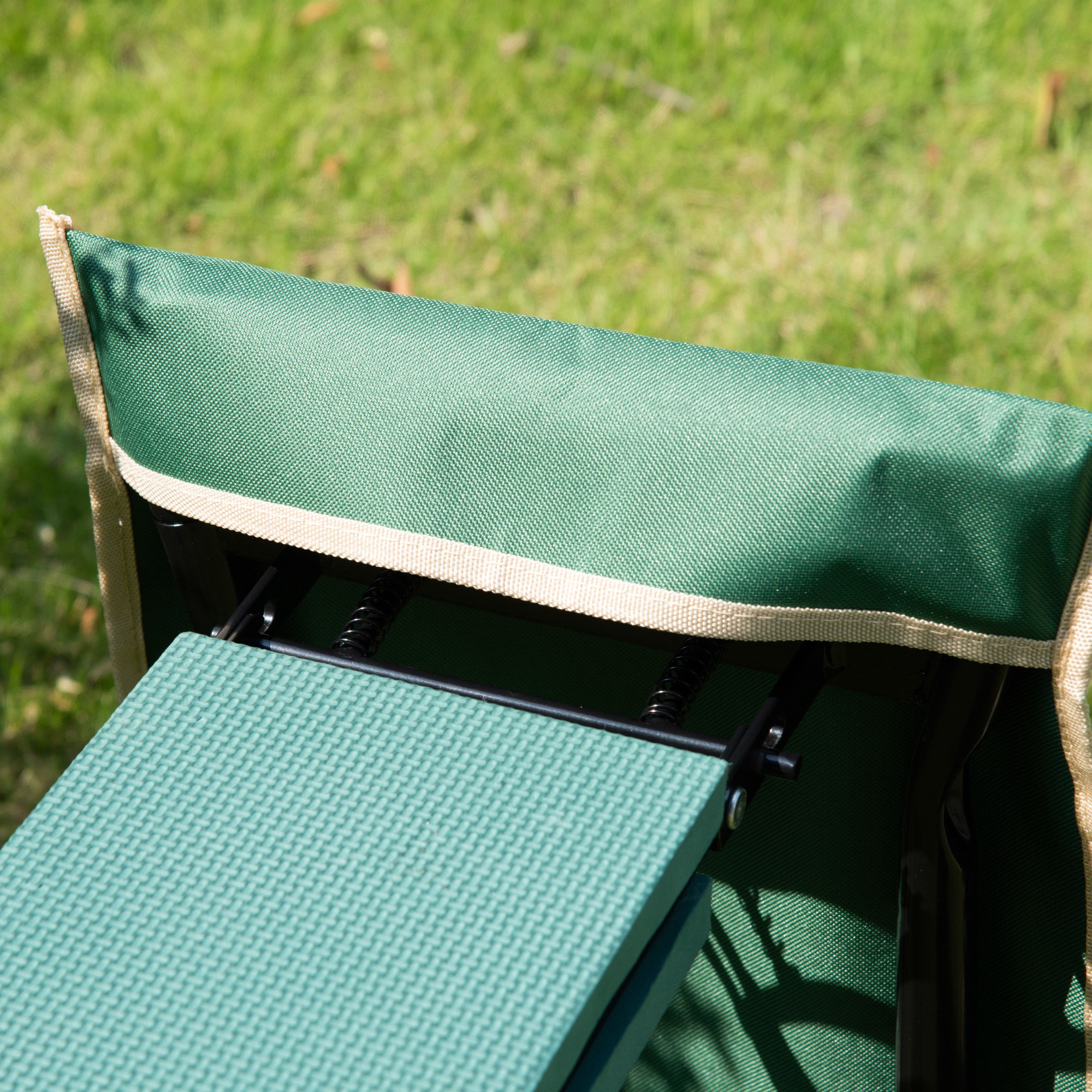 Close-up of EVA foam kneeling pad and steel frame construction