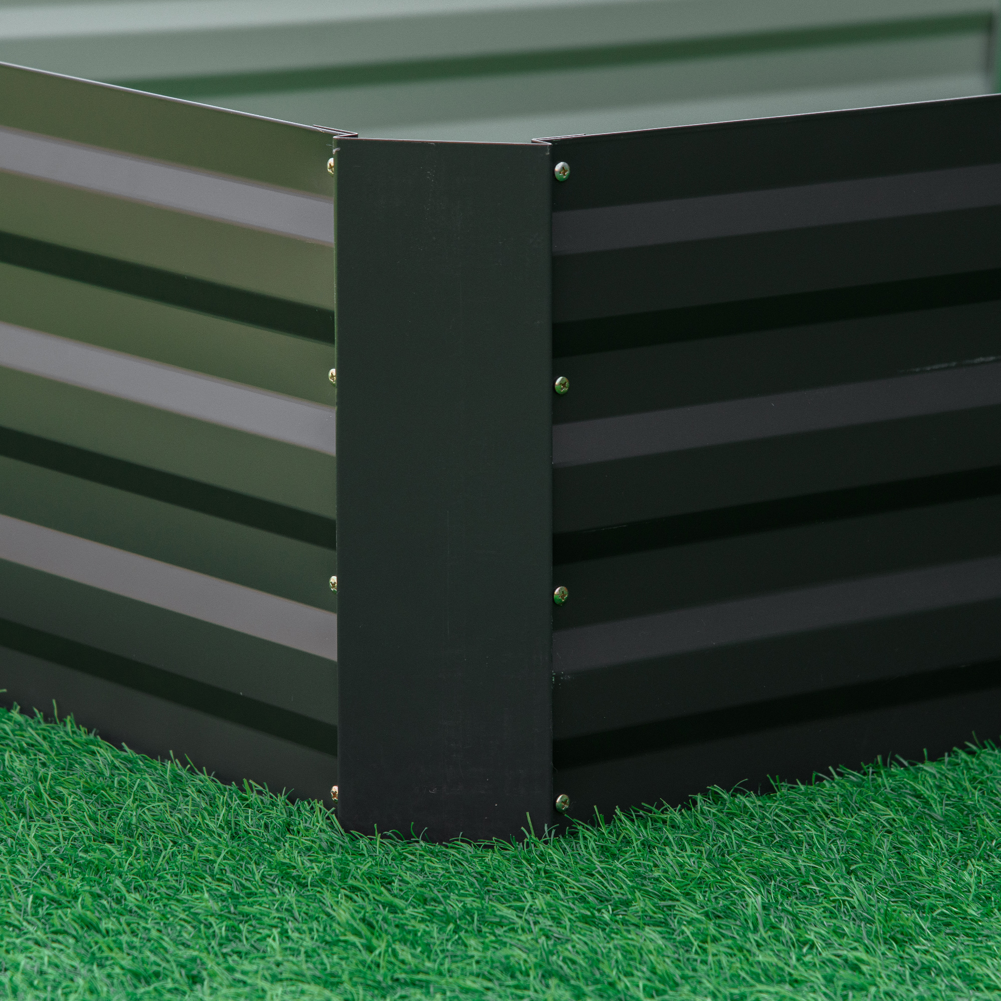 Raised garden bed filled with growing vegetables and herbs in a backyard garden