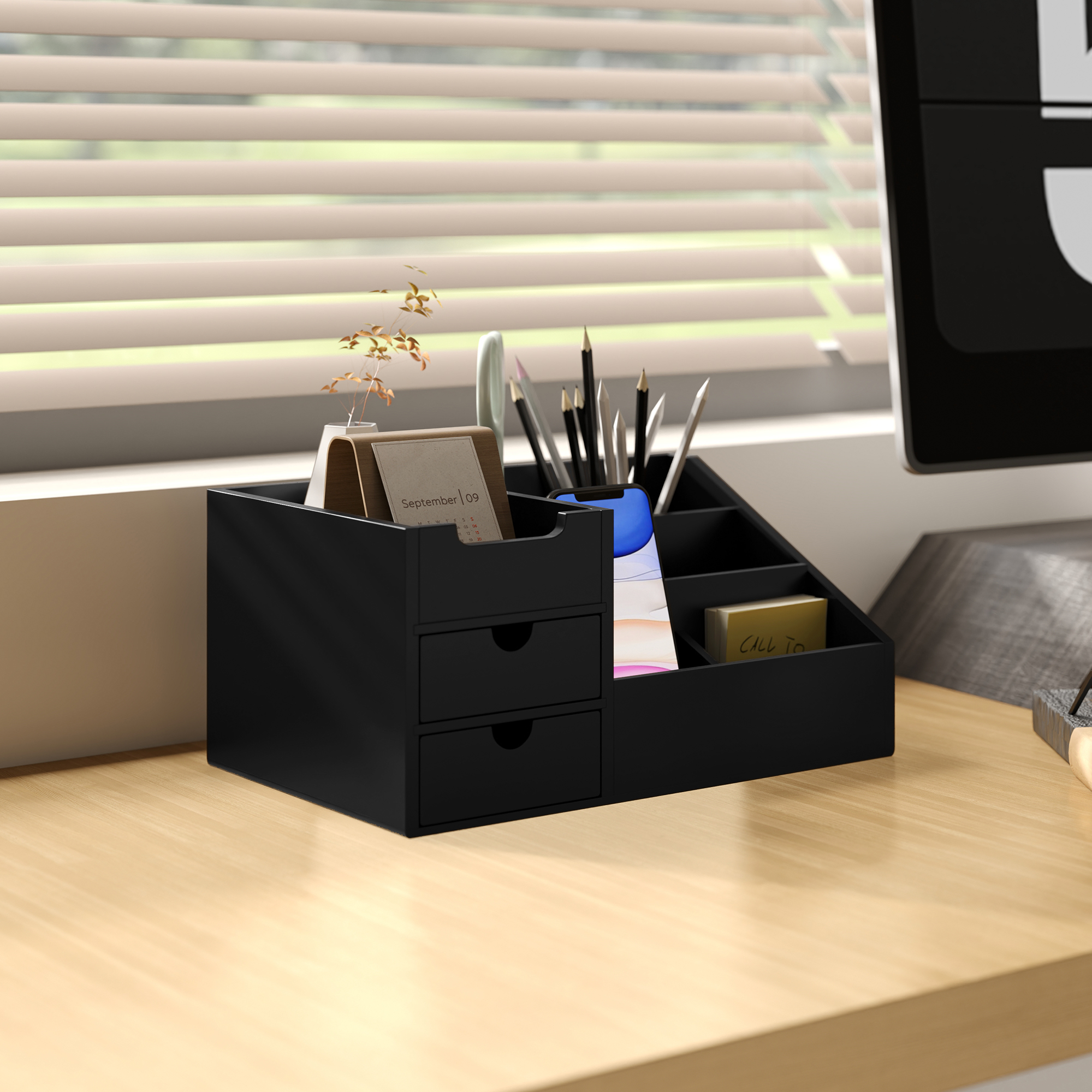 Black bamboo desk organiser with seven compartments and two drawers