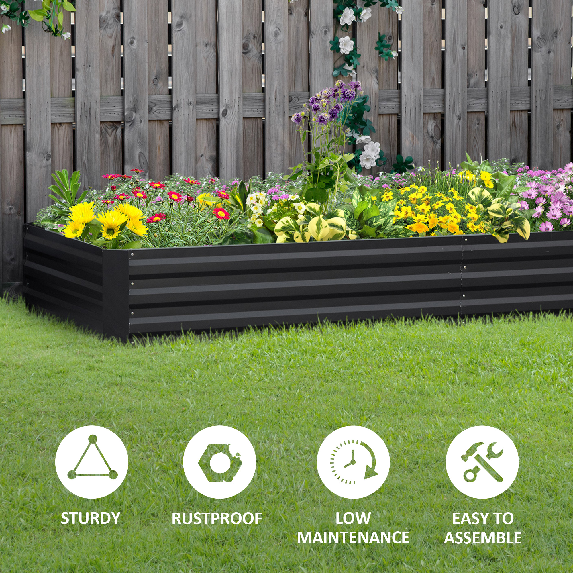 Galvanized steel raised garden bed in grey, shown assembled in an outdoor yard setting