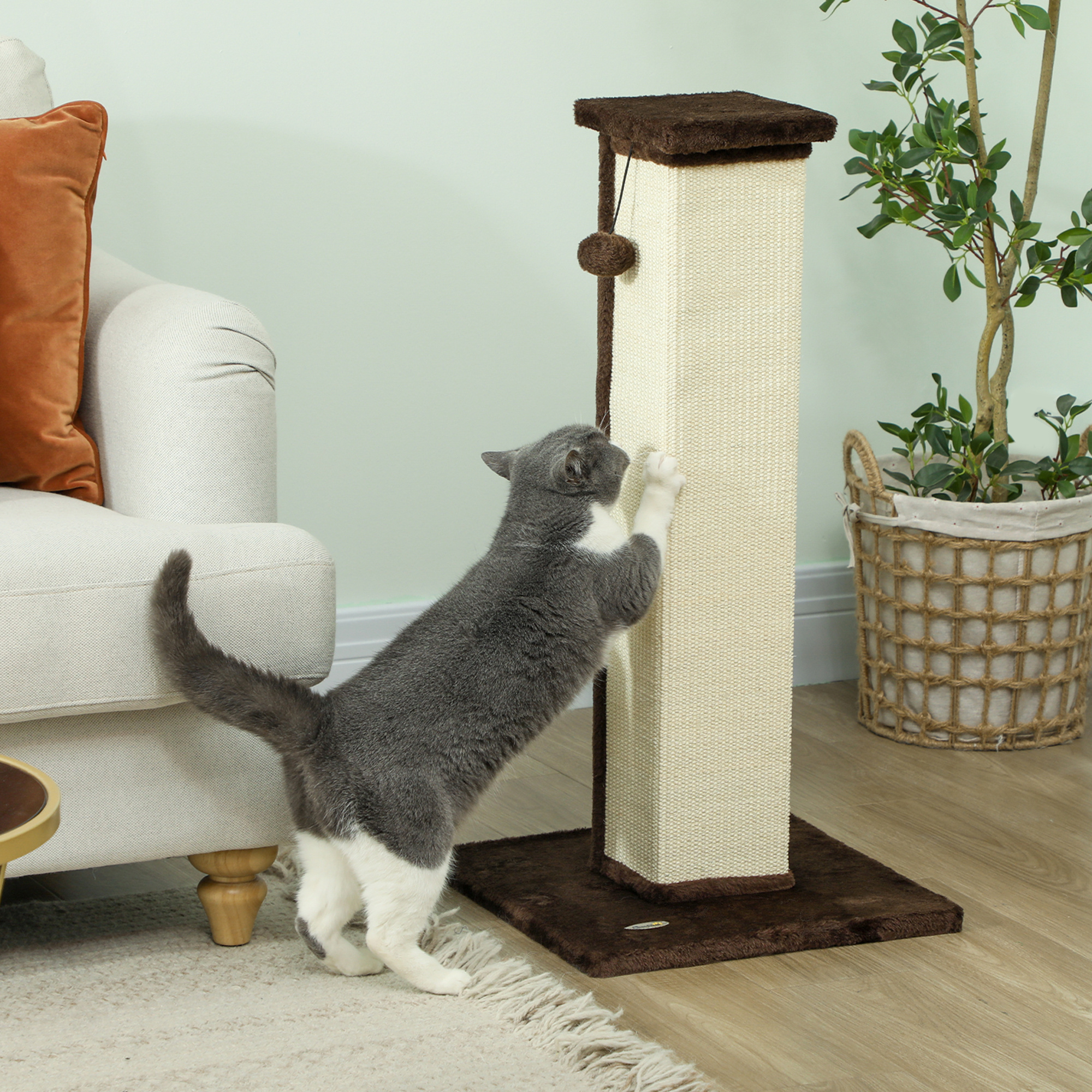 Tall vertical sisal cat scratcher with brown plush base