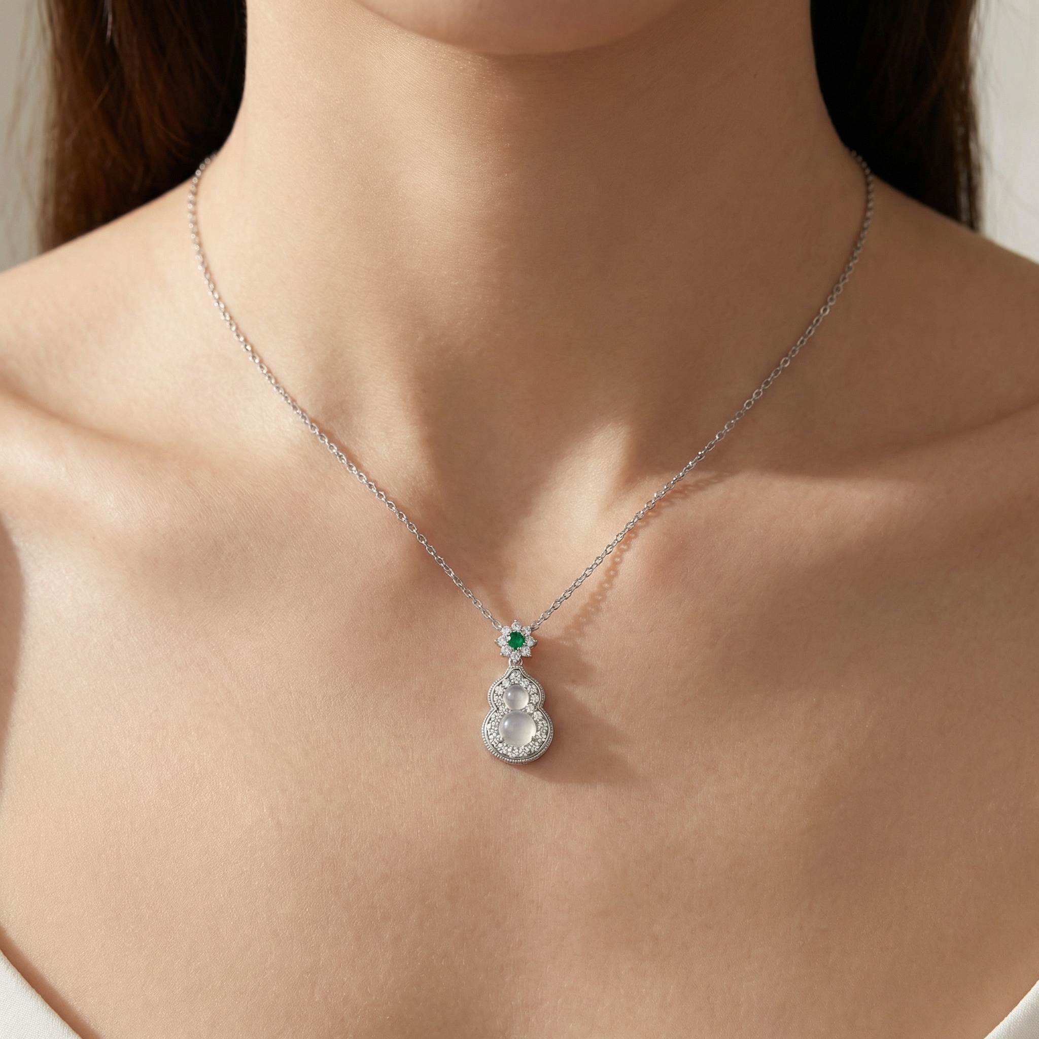 925 Sterling Silver Elegant Hulu Pendant Necklace with Translucent Moonstones and Green Emerald Accent