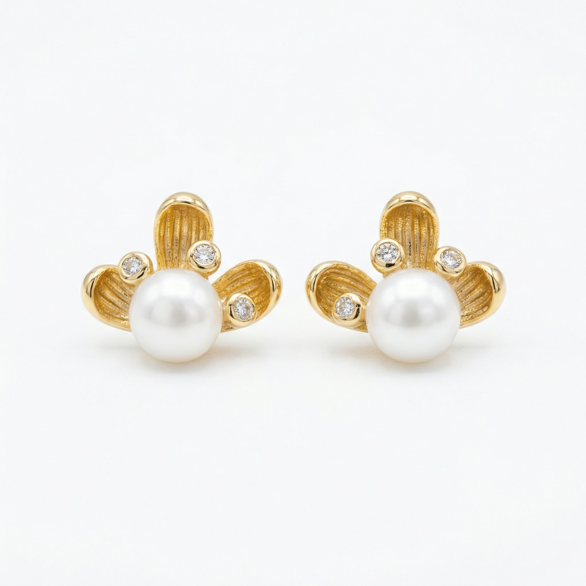 925 Sterling Silver Elegant Floral Pearl Stud Earrings with Shimmering Diamond Accents in Textured Setting