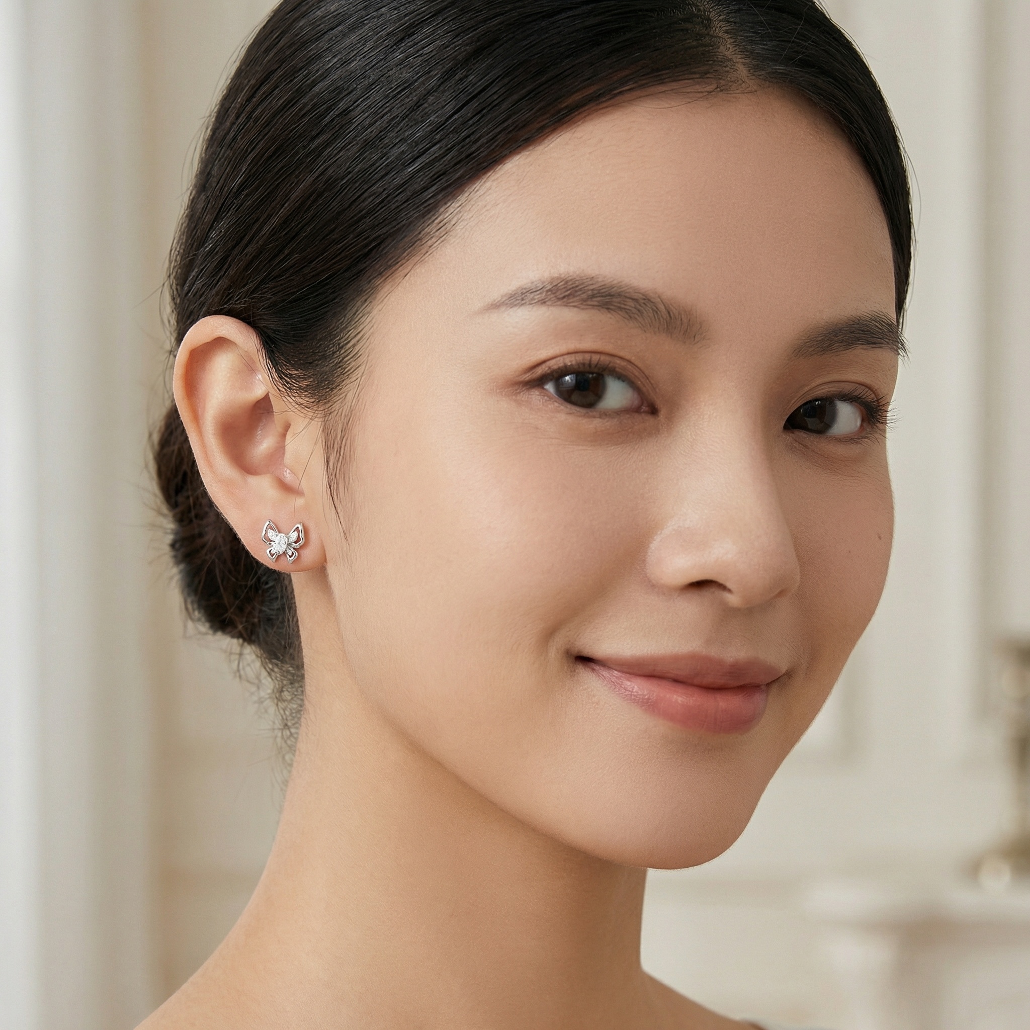 925 Sterling Silver Sparkling Silver Butterfly Stud Earrings with Pear-Cut Zirconia Accents