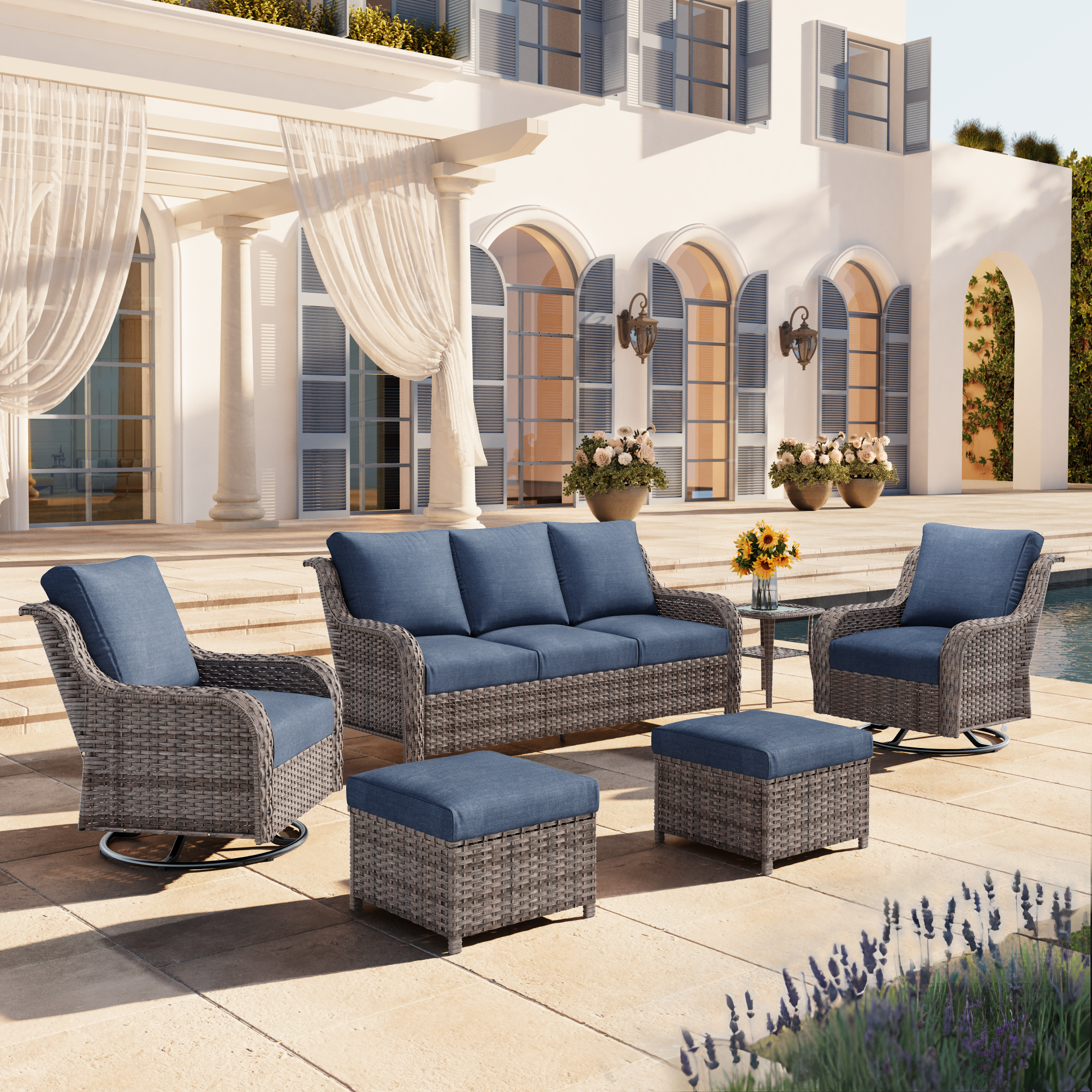 JB A Three-seater Sofa    Two Swivel Chairs    Two Footstools    A Side Table - Image 1